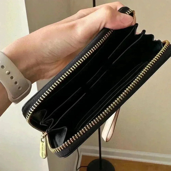 Michael Kors Black Wristlet with Gold Accents - Picture 14 of 14